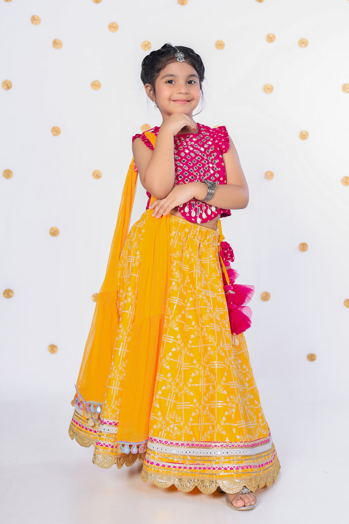 Girls' Pink Mirror Work Choli and Yellow Printed Lehenga Set - CuddlesClothing