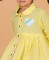 Fun & Frolic Yellow Layered Dress with Heart Patch